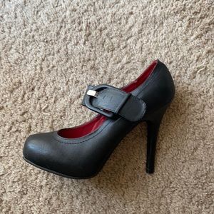 New! Mary Janes in black with red sole.